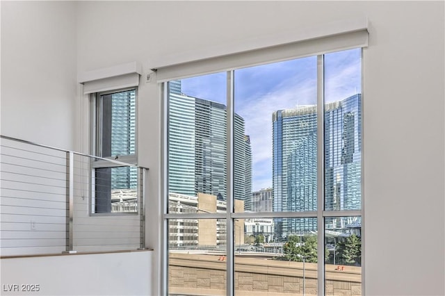 doorway to outside with a healthy amount of sunlight and a city view