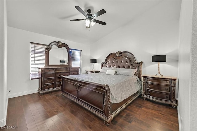 bedroom featuring ceiling fan, baseboards, and dark wood-style flooring