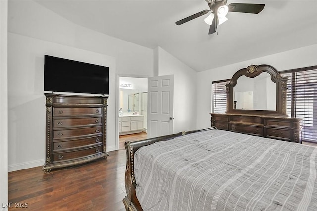 bedroom with dark wood-style floors, a ceiling fan, connected bathroom, vaulted ceiling, and baseboards