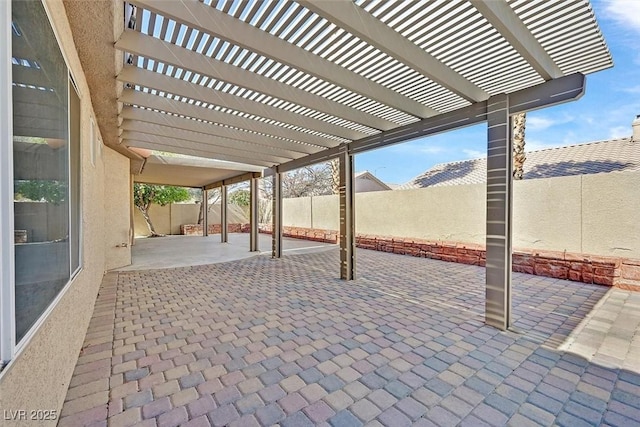 view of patio / terrace with a fenced backyard and a pergola