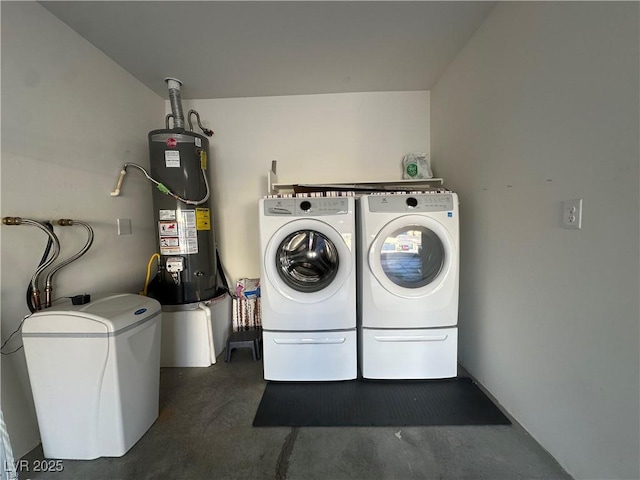 laundry area with independent washer and dryer, laundry area, and gas water heater