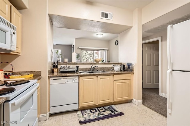 8000 W Badura Ave Unit 1019, Las Vegas, NV 89113 - kitchen with white appliances and light brown cabinets