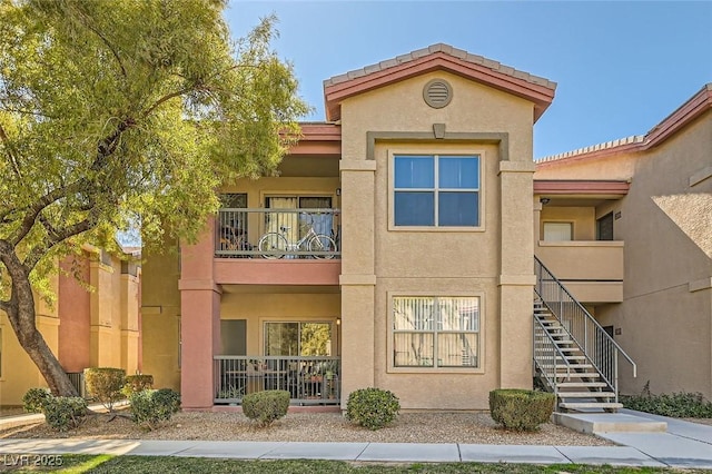 view of property with stairway