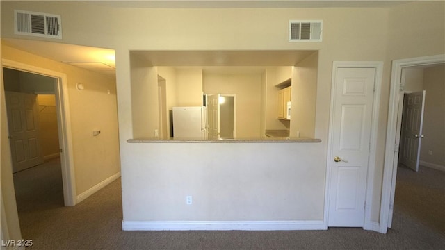 8000 W Badura Ave Unit 1019, Las Vegas, NV 89113 - kitchen featuring freestanding refrigerator and carpet floors