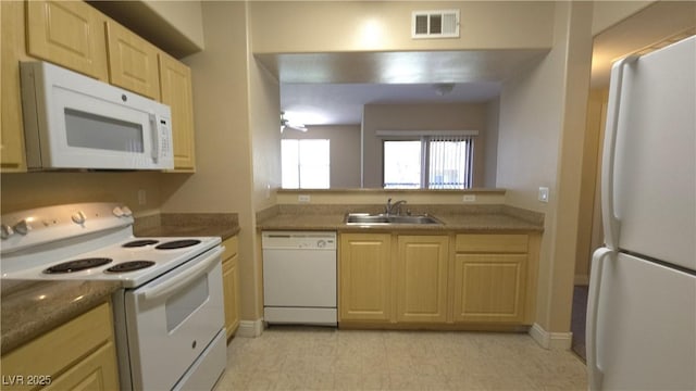 8000 W Badura Ave Unit 1019, Las Vegas, NV 89113 - kitchen featuring white appliances and light brown cabinetry