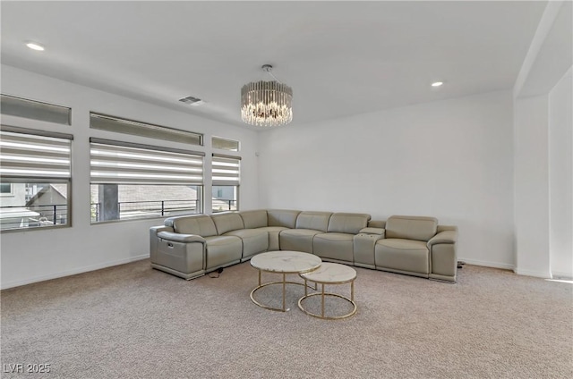 living area featuring visible vents, baseboards, an inviting chandelier, carpet floors, and recessed lighting