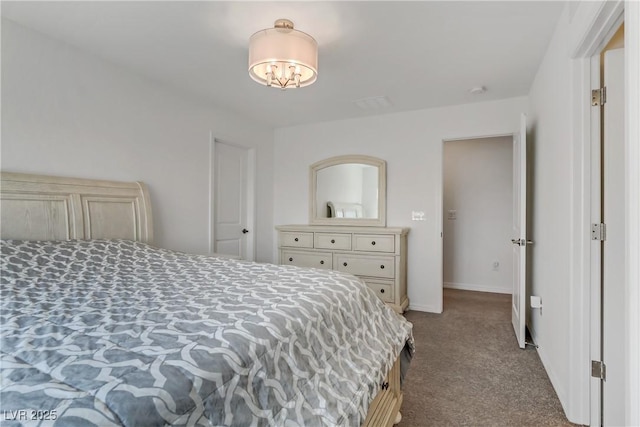 bedroom featuring light carpet and baseboards