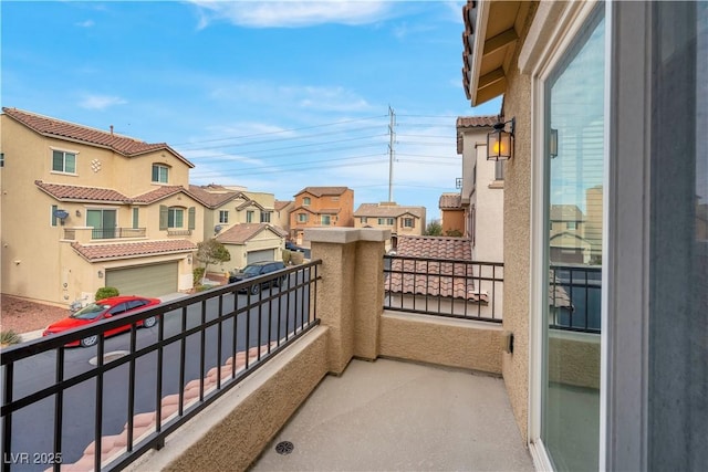 balcony featuring a residential view