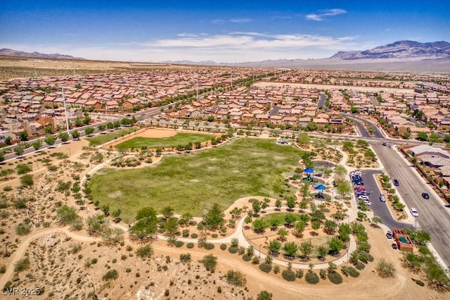 drone / aerial view featuring a mountain view and a residential view