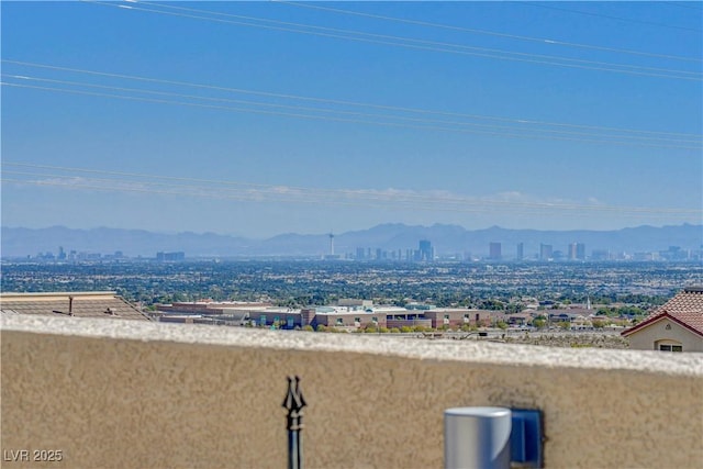 mountain view featuring a view of city