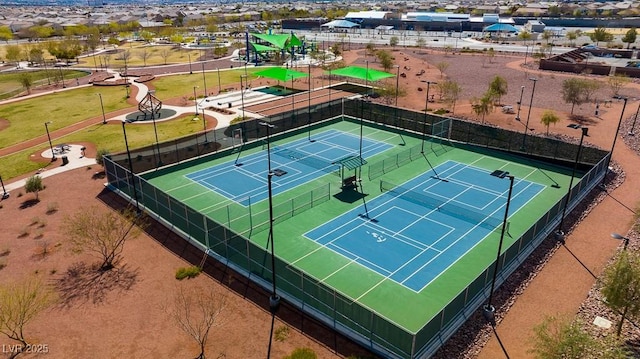 view of tennis court with fence