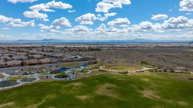 birds eye view of property featuring a mountain view and a residential view