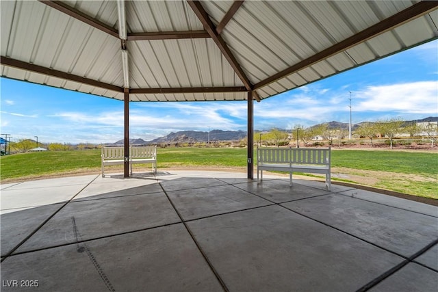 view of patio / terrace with a mountain view