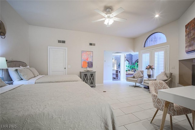 bedroom with light tile patterned floors, ceiling fan, visible vents, and access to exterior