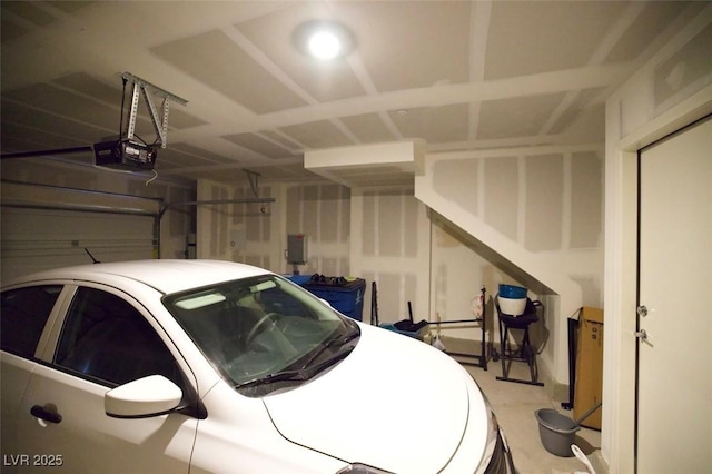 garage featuring a garage door opener