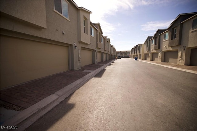 view of road with a residential view