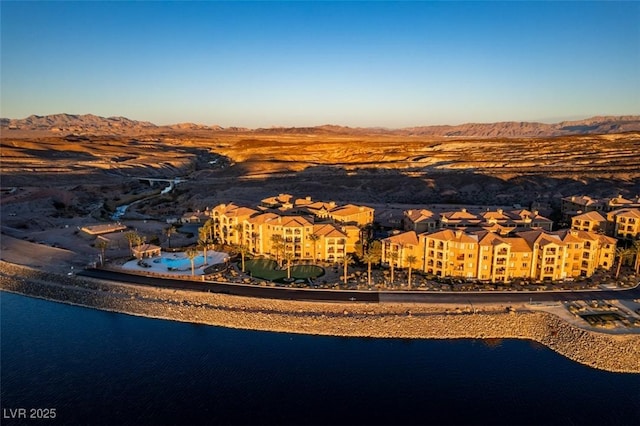 aerial view with a residential view and a water and mountain view