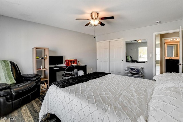 bedroom featuring ceiling fan, a closet, and wood finished floors