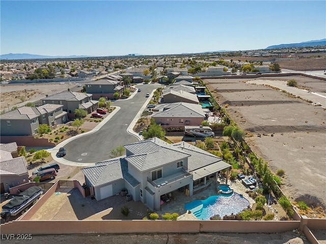 bird's eye view featuring a mountain view and a residential view