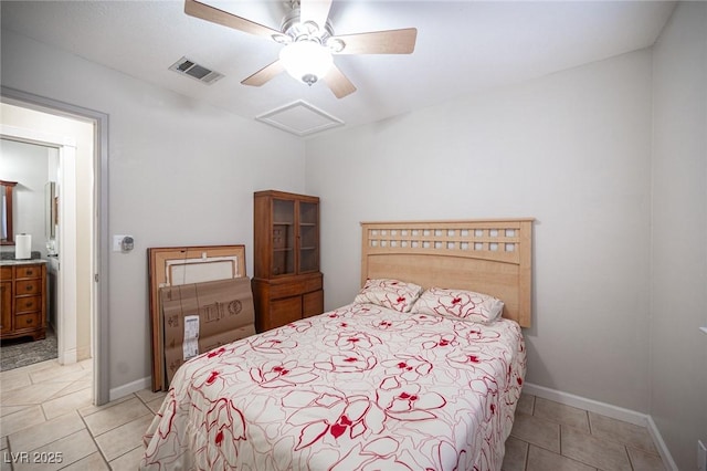 bedroom with attic access, visible vents, baseboards, and light tile patterned flooring