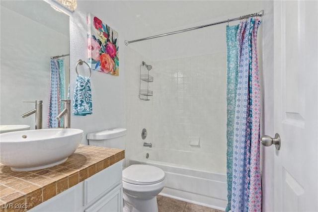 full bath with toilet, shower / tub combo, a sink, and tile patterned floors