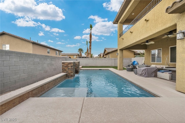 view of swimming pool with a patio, a fenced backyard, a ceiling fan, and a fenced in pool