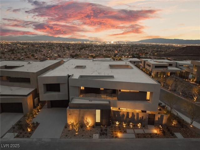 rear view of property featuring a mountain view