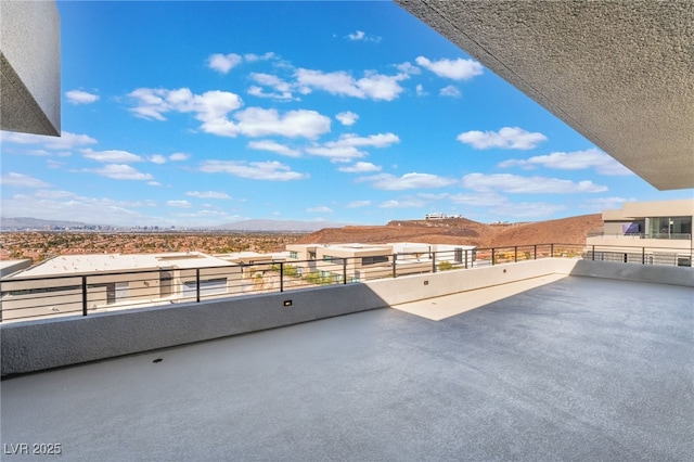 view of patio with a balcony