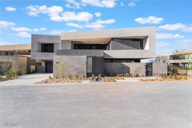 view of building exterior with driveway