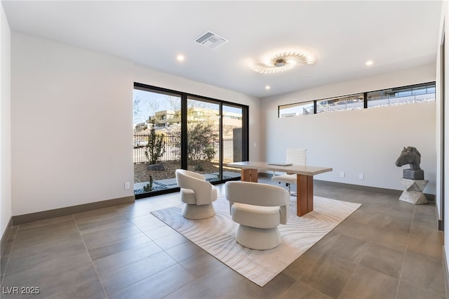 tiled office space with recessed lighting, visible vents, and baseboards