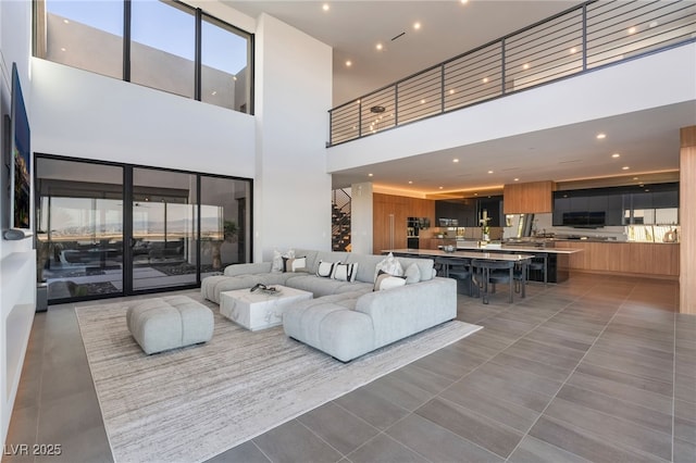 tiled living area with recessed lighting