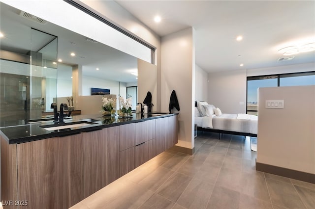 reception area with a sink and visible vents