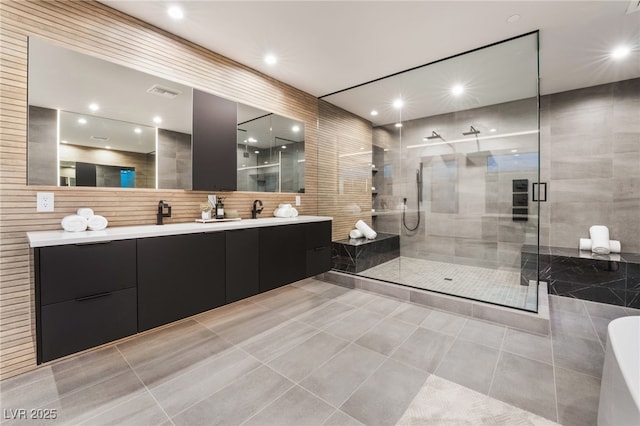 full bathroom featuring visible vents, tile patterned floors, vanity, a shower stall, and recessed lighting