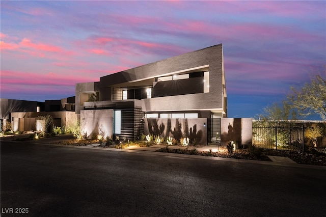 801 Dragons Eye Dr, Henderson, NV 89012 - contemporary home featuring a gate, fence, and stucco siding