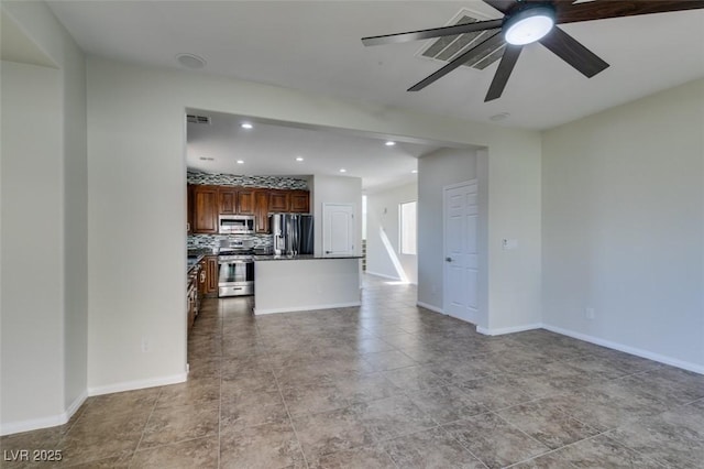 unfurnished living room with recessed lighting, visible vents, ceiling fan, and baseboards