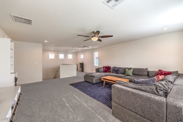 living room featuring a ceiling fan, carpet, visible vents, and recessed lighting