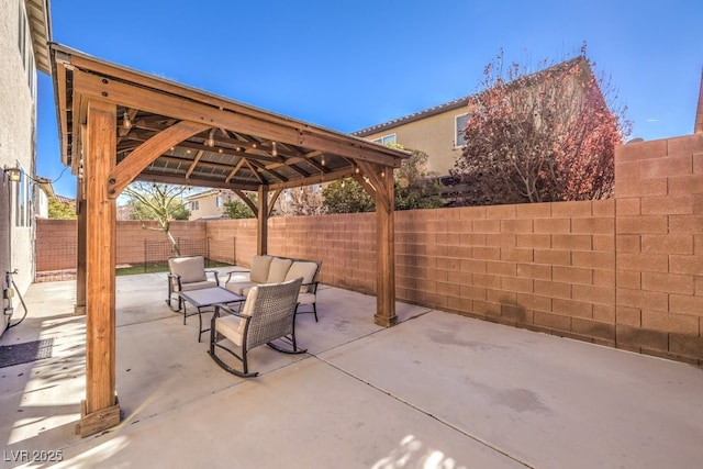 view of patio with outdoor lounge area and a fenced backyard