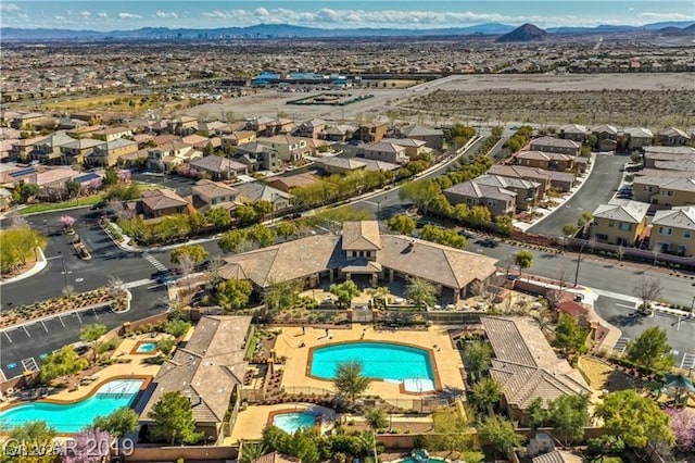 bird's eye view with a mountain view and a residential view