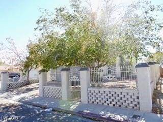 view of gate featuring fence