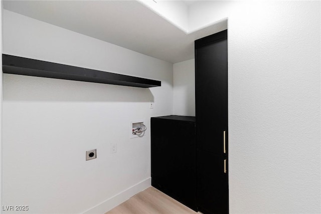 laundry room featuring laundry area, washer hookup, wood finished floors, baseboards, and electric dryer hookup