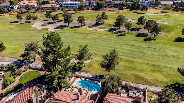 bird's eye view with view of golf course