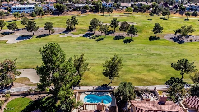 bird's eye view with golf course view and a residential view