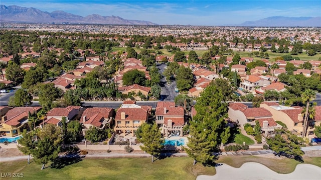 drone / aerial view with a residential view and a mountain view