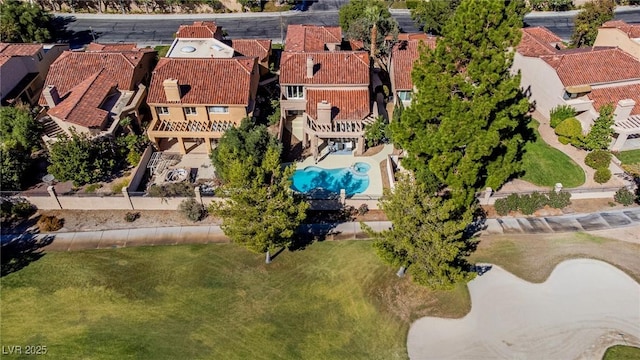 birds eye view of property with a residential view