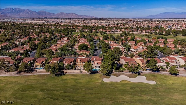 bird's eye view with a residential view and a mountain view