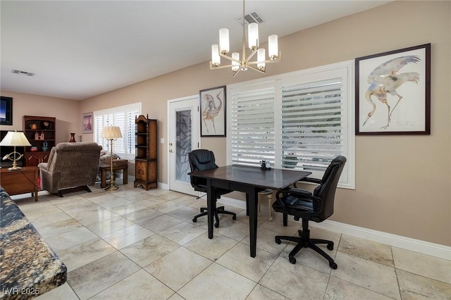 office area featuring a notable chandelier, visible vents, and baseboards