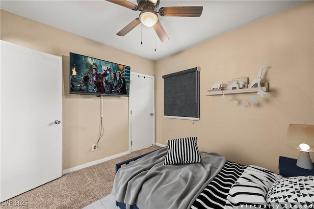 carpeted bedroom featuring ceiling fan