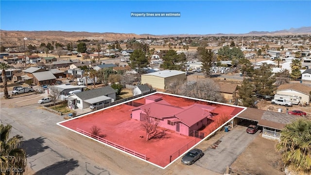 bird's eye view with a residential view and a mountain view