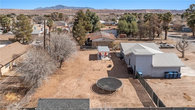 birds eye view of property with a residential view and a mountain view
