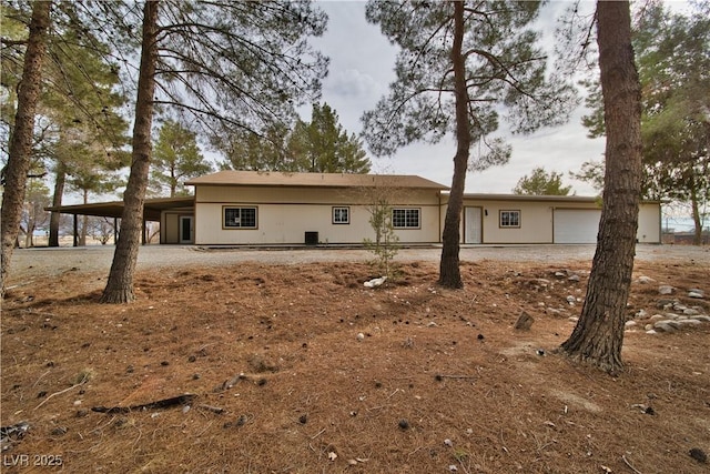 view of front facade with an attached carport